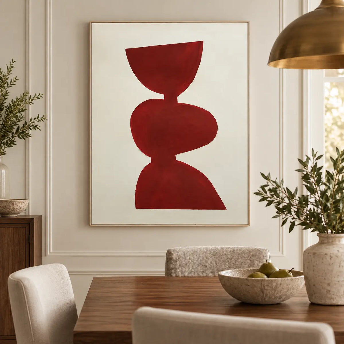 A Balance in Vermilion: behind a wood dining table with cream chairs and a brass pendant