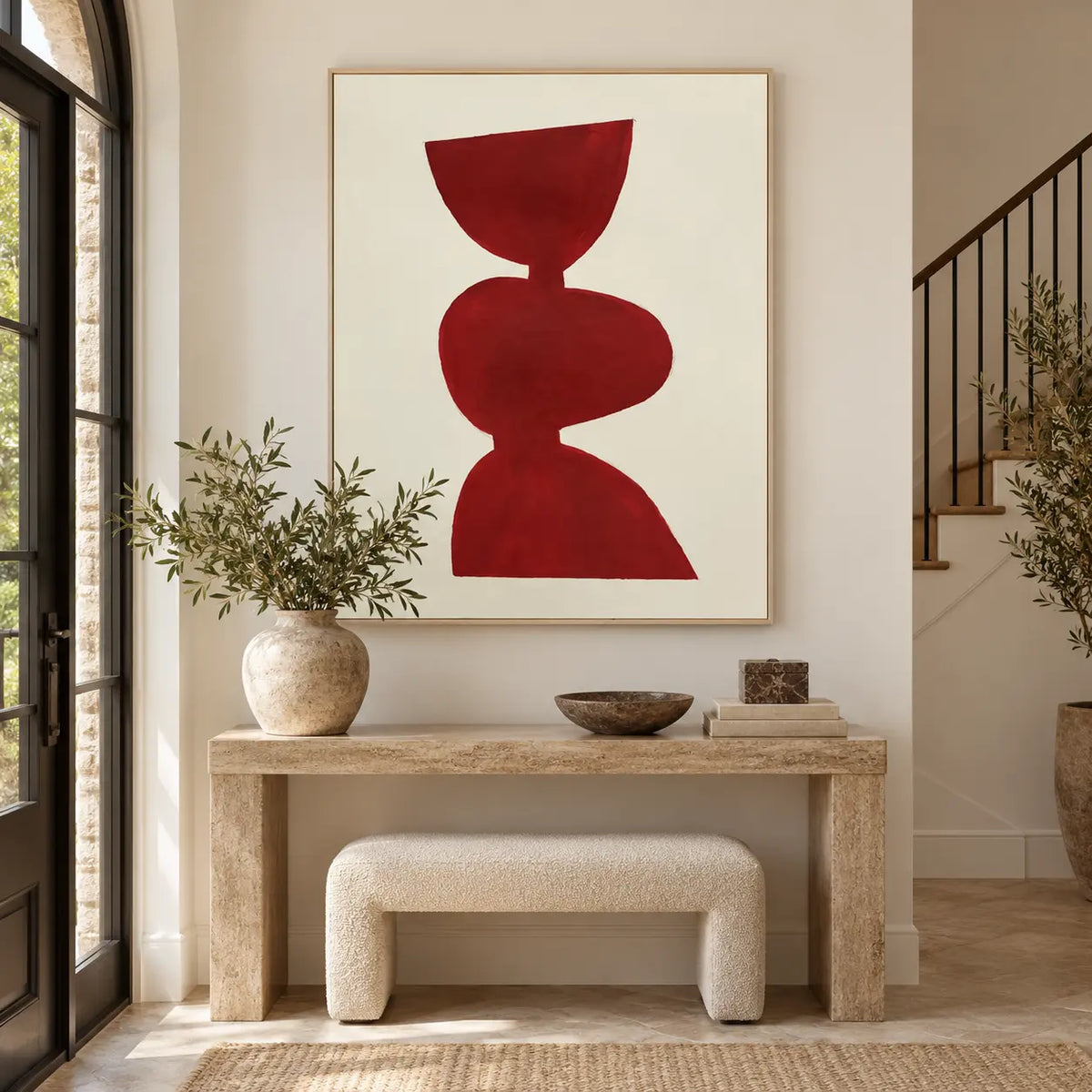A Balance in Vermilion: above a stone entrance console and boucle bench beside a staircase