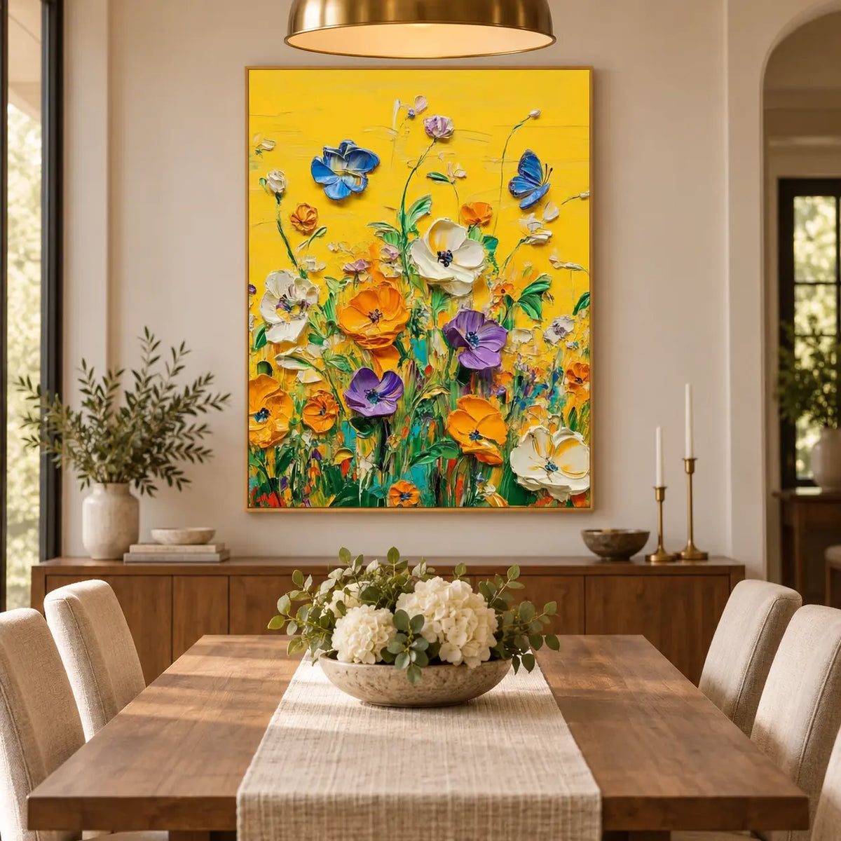 A Blue Visitor in the Garden: over a dining sideboard behind a table with a woven runner