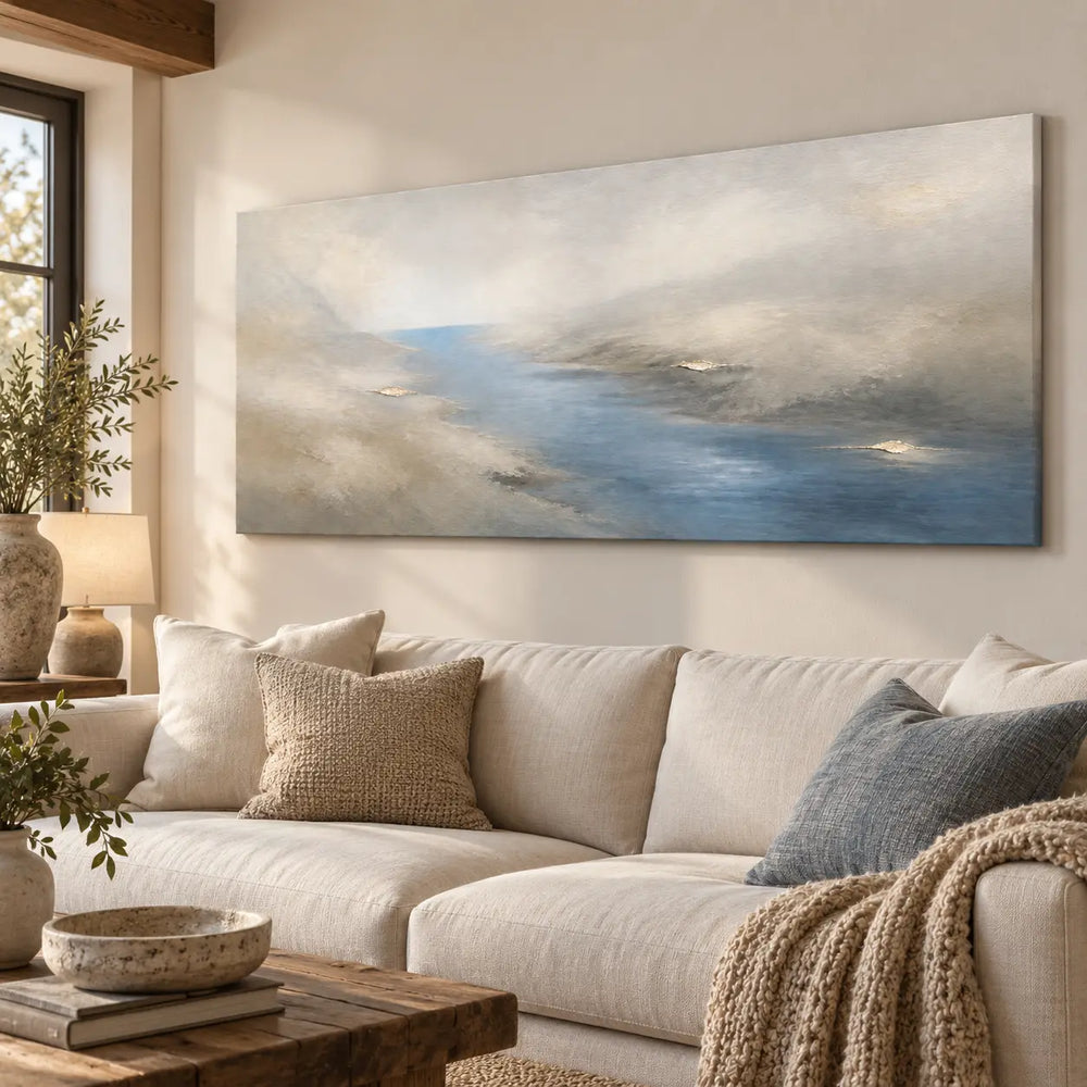 A Channel Through Pearl: angled above a cream sectional beneath a wooden ceiling beam