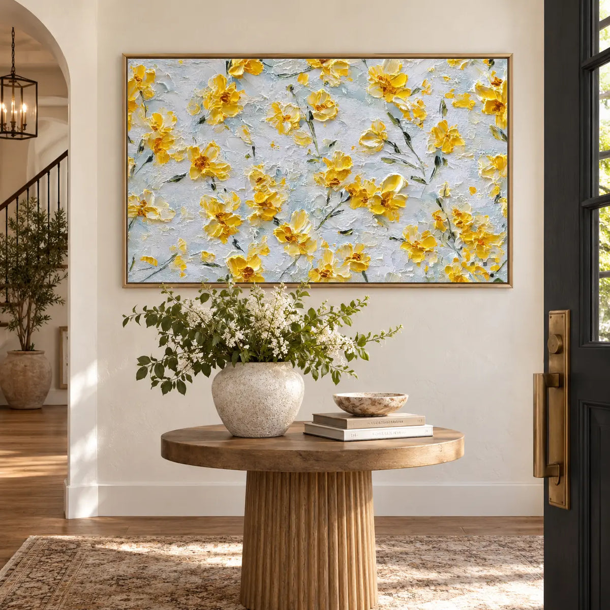 A Scattering of Sunlit Petals: above a round entry table beside a black door