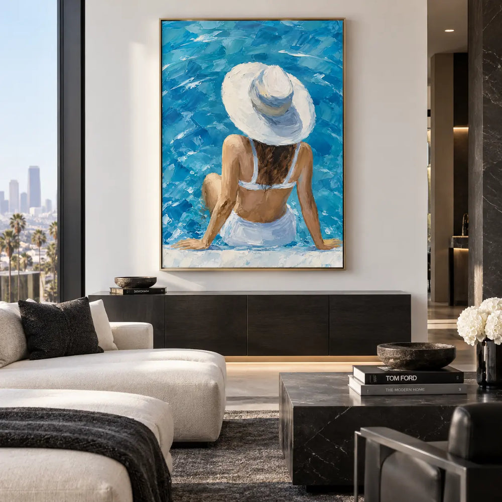 Beneath a Sunhat Brim: above a long black console near a cream sectional and veined table