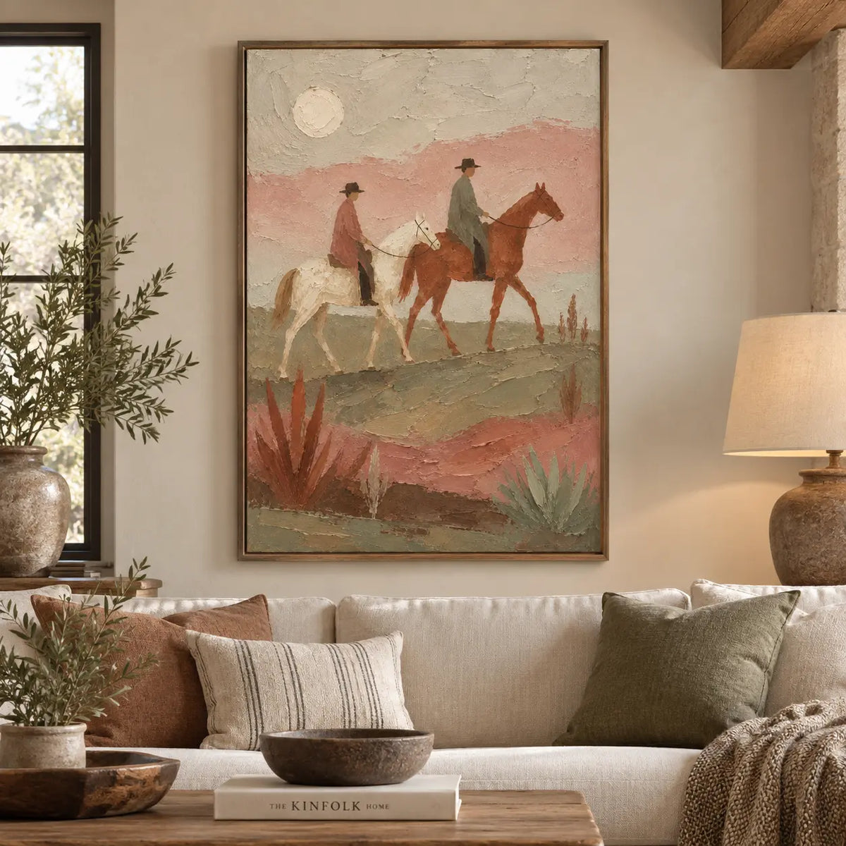 Beneath the Desert Moon: framed above a cream sofa with rust and olive cushions