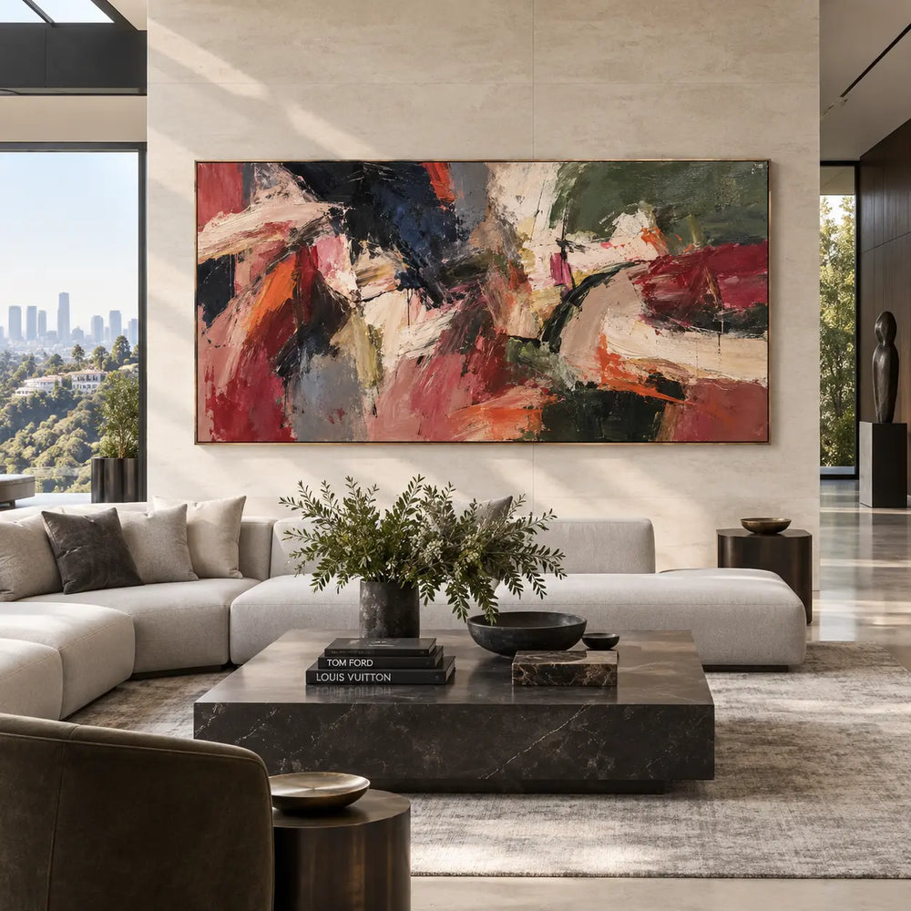Crosscurrents of Rust and Ivory: above a white sectional beside floor-to-ceiling glazing and a leather chair