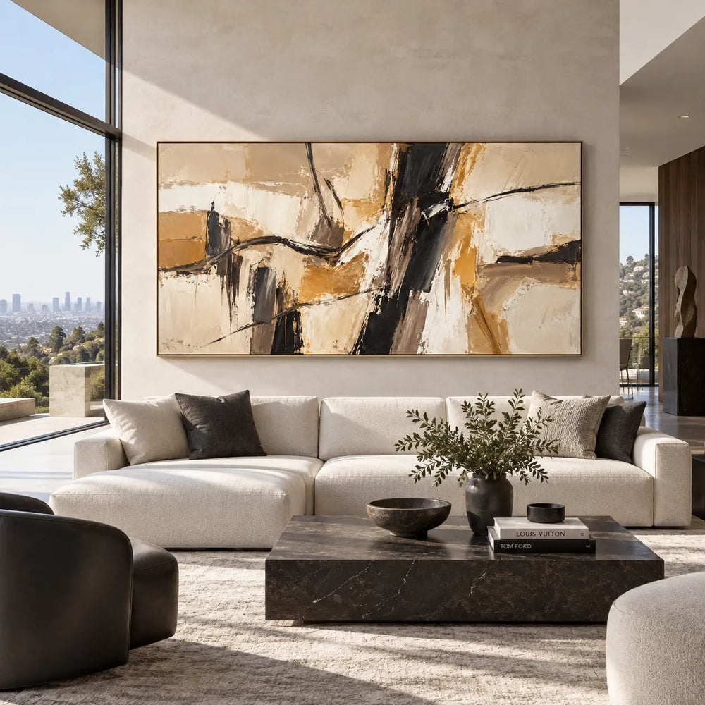 Ochre Across the Dark Divide: above a white sectional beside full-height glazing and a dark block table