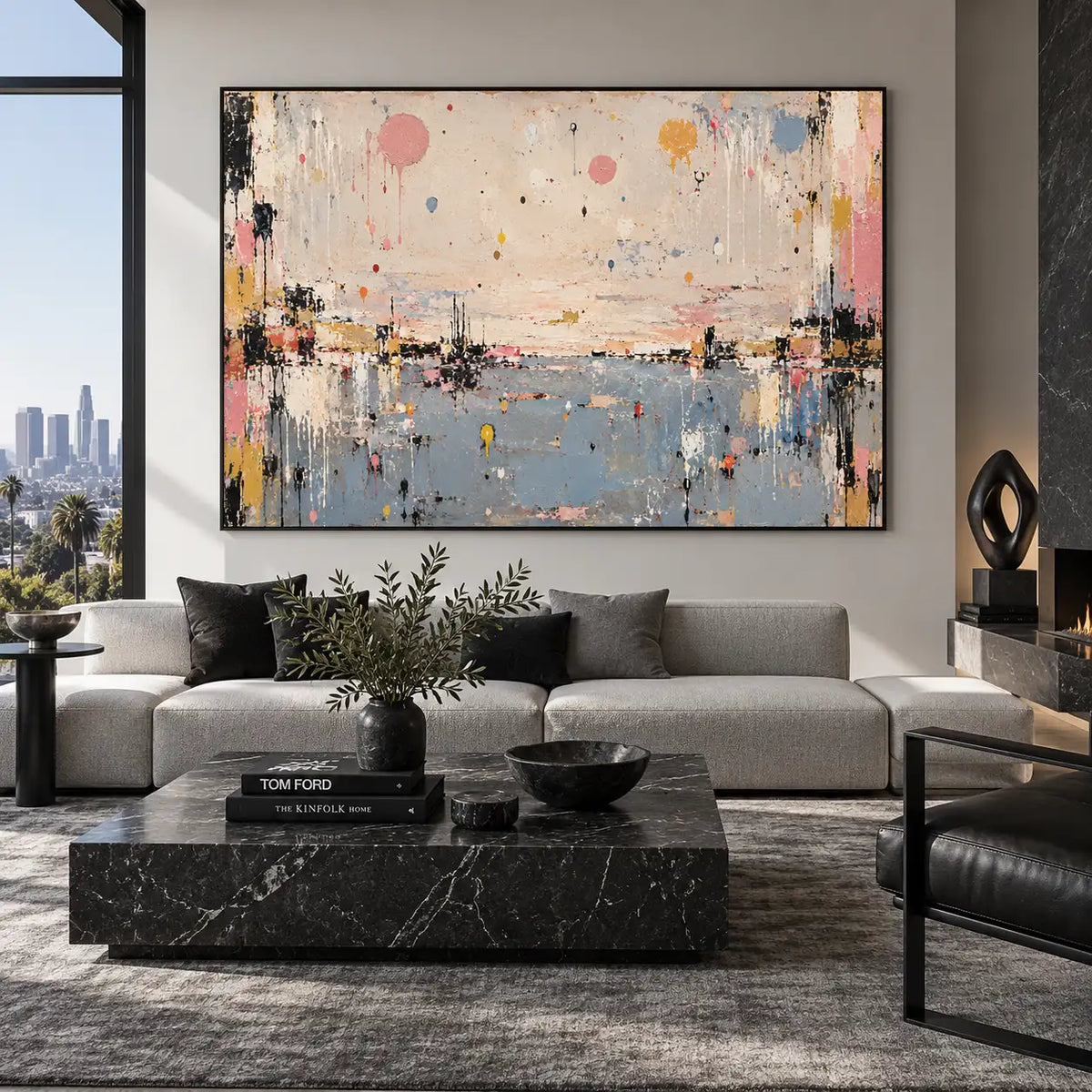 Pastel Drops Above Blue: above a gray sofa with black cushions and a veined marble table