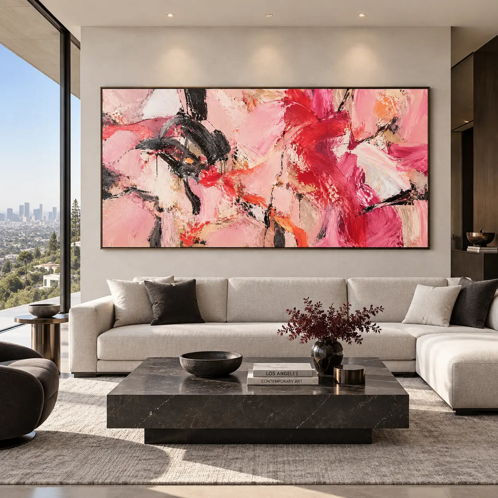 Scarlet Sweeps in Open Pink: above a white sectional with dark cushions and a rectangular marble table