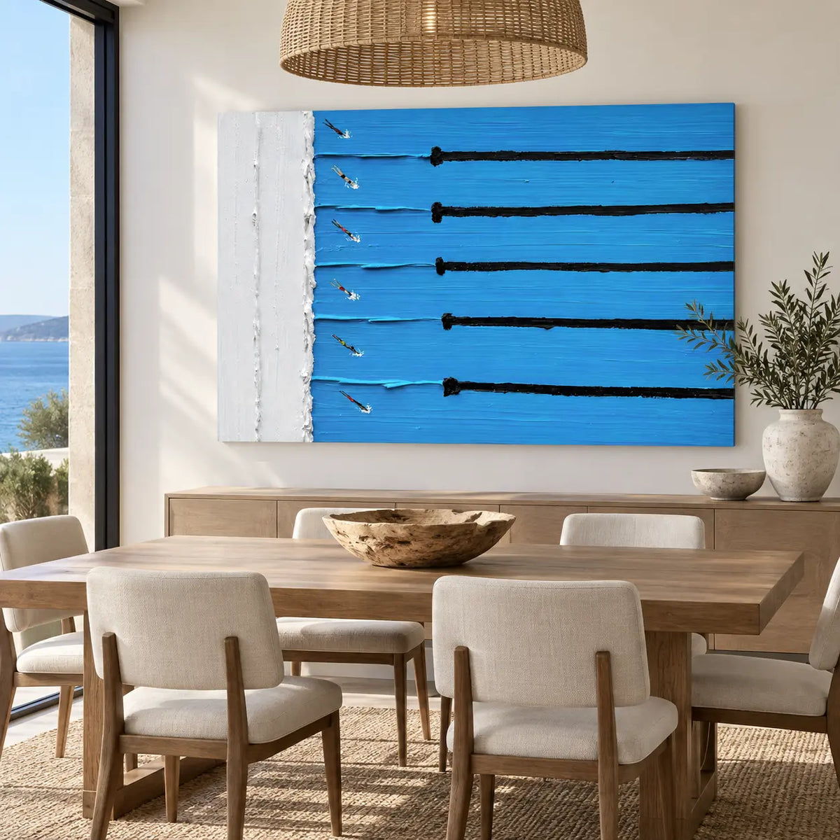 Six Lanes from the Edge: above a dining sideboard behind a wood table under a woven pendant