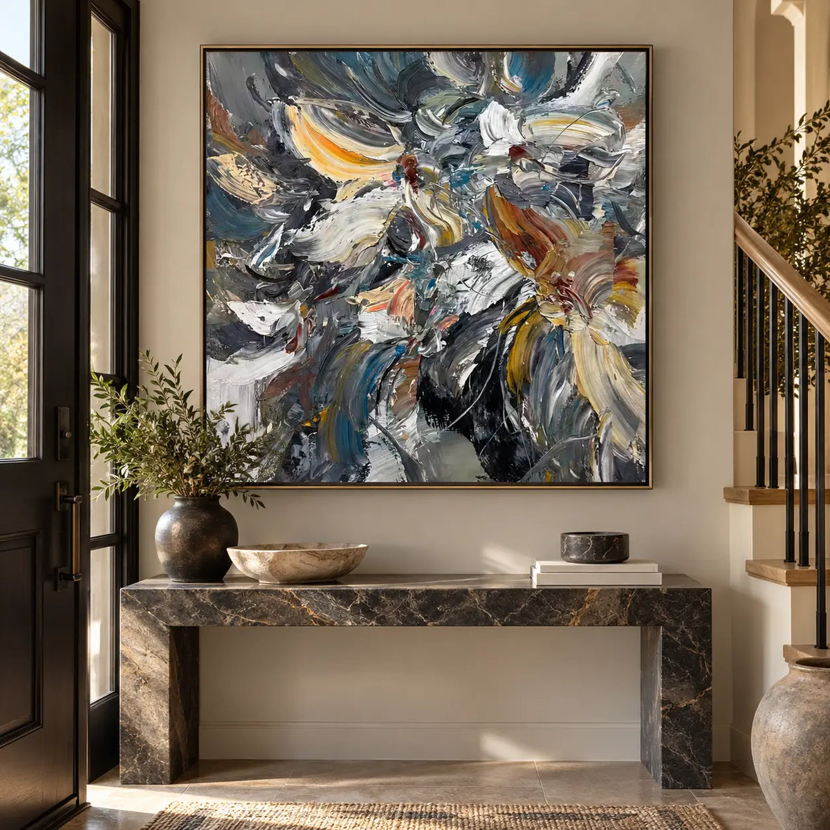 Slate in Motion: above a dark marble console beside a staircase