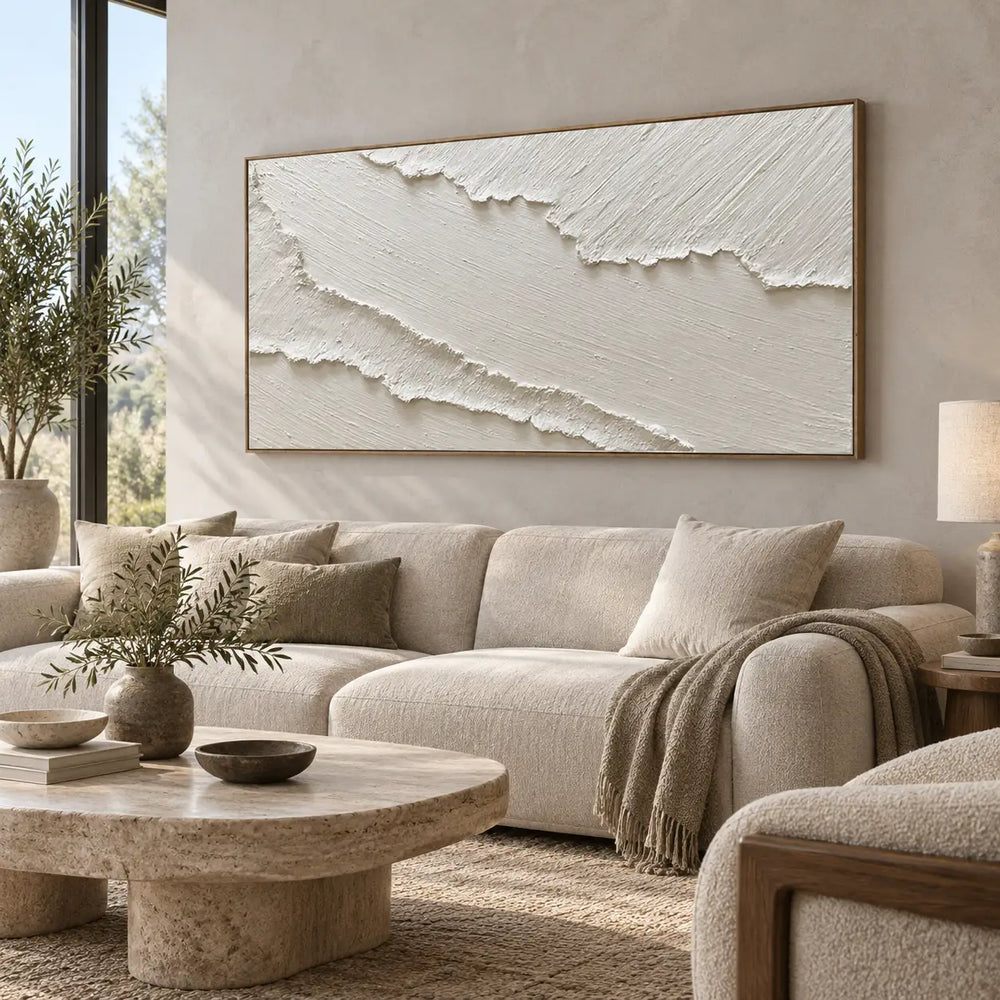 The Pale Divide: above a cream sofa beside a tall window and round stone table