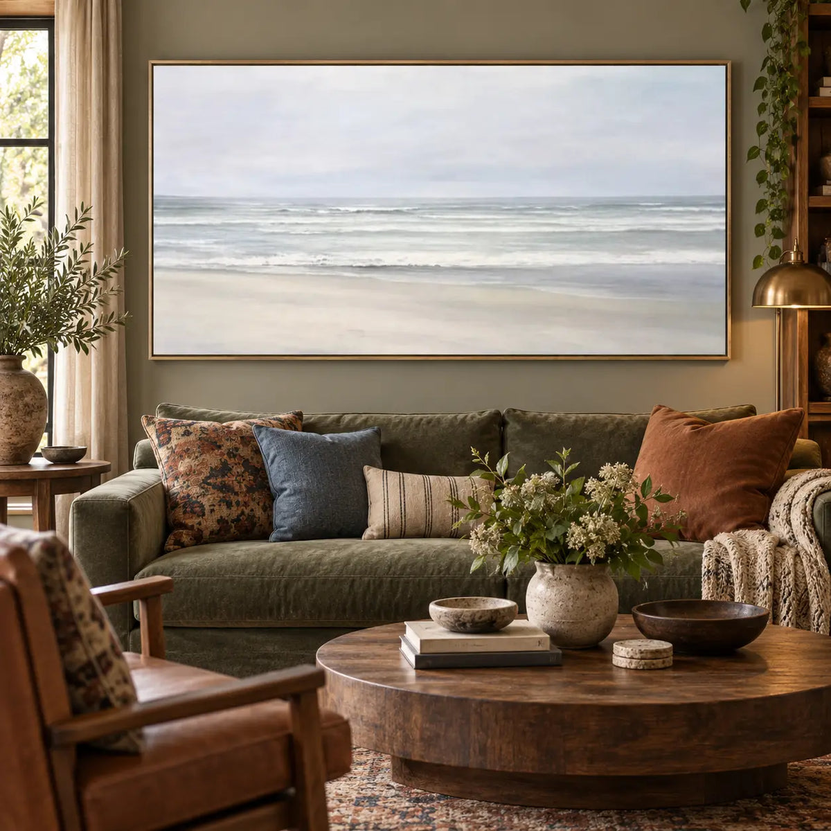 The Shore in Silver Light: above an olive sofa with rust and blue cushions