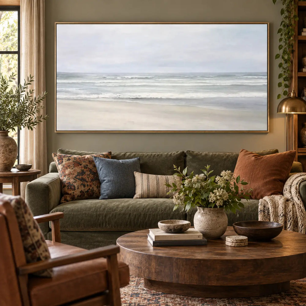 The Shore in Silver Light: above an olive sofa with rust and blue cushions
