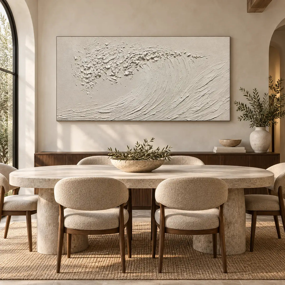 The Uncolored Breaker: above a dining sideboard behind an oval stone table