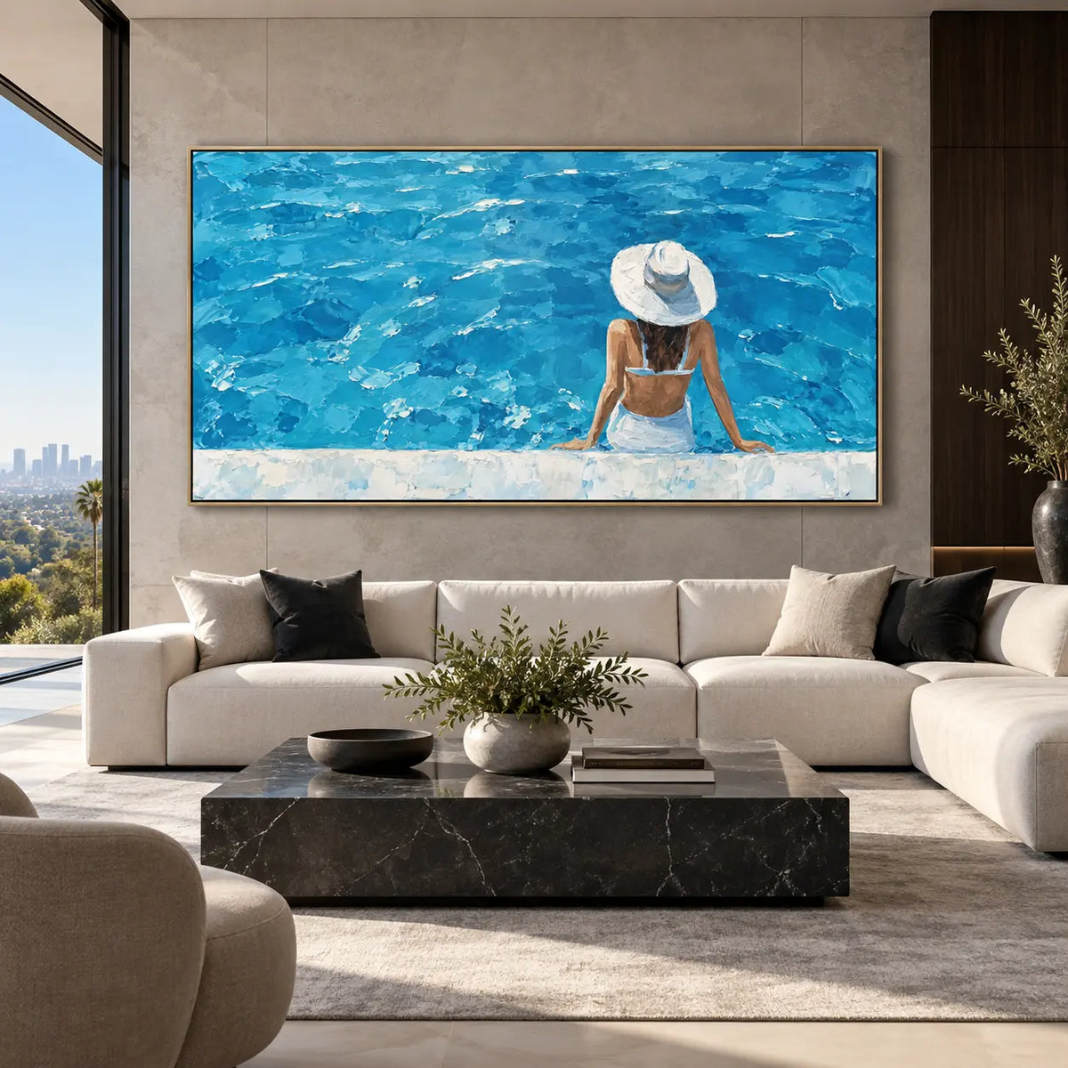 The Wide Blue Afternoon: above a cream sectional and square black marble table