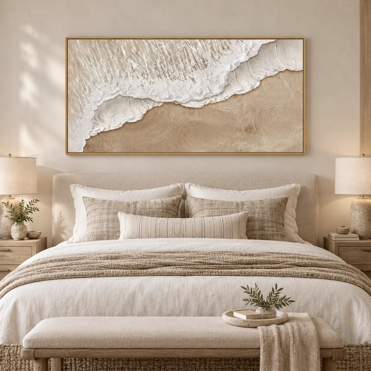 Where Foam Meets Sand: above a linen bed and pale wood bench with a leafy tray