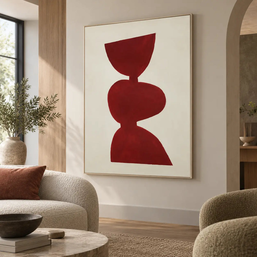 A Balance in Vermilion: beside an arched opening with rounded cream seating and a tall window