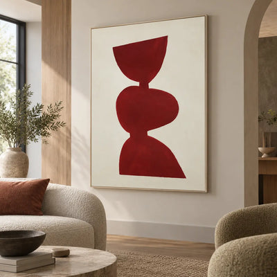 A Balance in Vermilion: beside an arched opening with rounded cream seating and a tall window