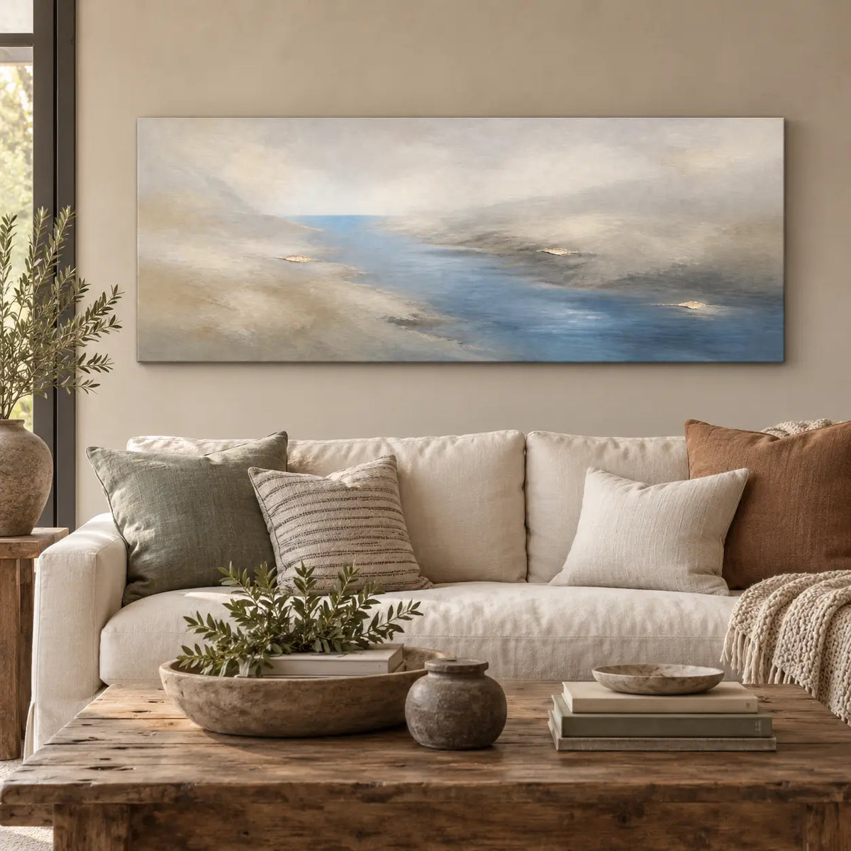 A Channel Through Pearl: above a cream sofa with sage and rust cushions and a gray ceramic jar