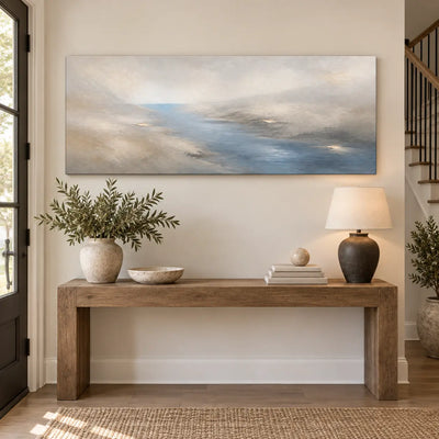 A Channel Through Pearl: above a wood console beside a staircase and dark ceramic lamp