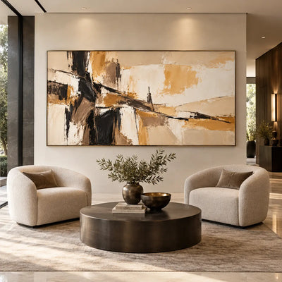A Dark Seam Through Sand: above two rounded cream chairs and a round coffee table beside a hallway