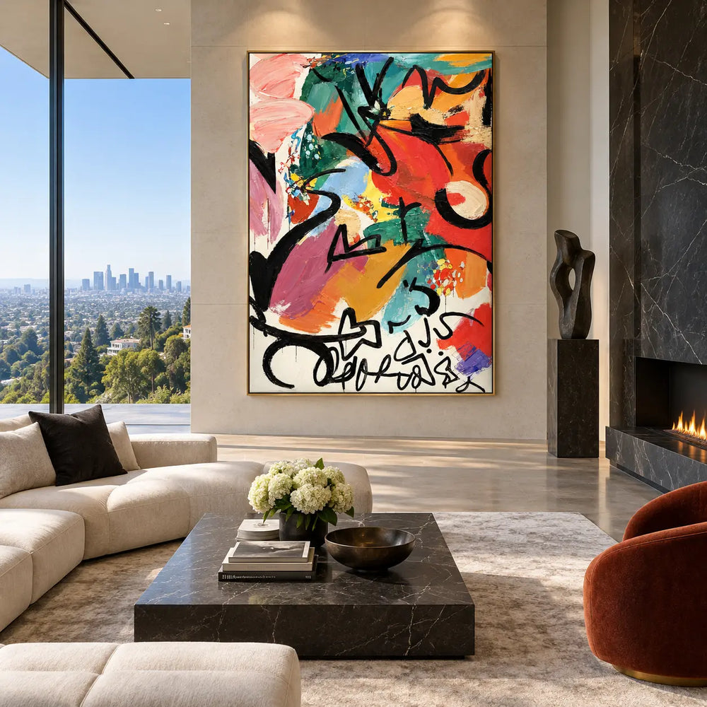 A Flourish Below the Color: beside a black stone fireplace behind white seating and rust armchairs