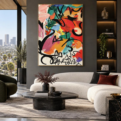 A Flourish Below the Color: above a curved white sofa beside illuminated display shelves