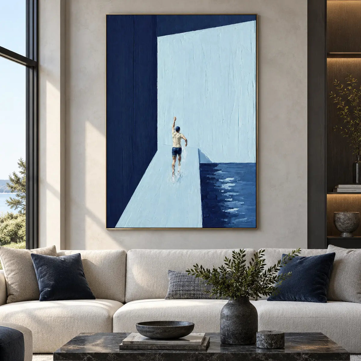 A Gesture Above the Water: above a cream sofa with navy cushions and a black stone coffee table