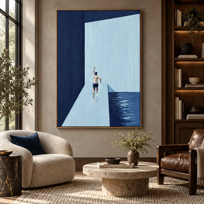 A Gesture Above the Water: above a round stone coffee table between cream and leather armchairs