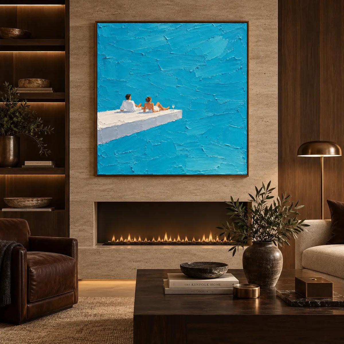A Ledge for Two: above a fireplace behind a dark wooden table and cream sofa