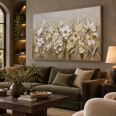 A Meadow in Linen Light: above an olive sofa beside illuminated arched shelves and a shaded lamp