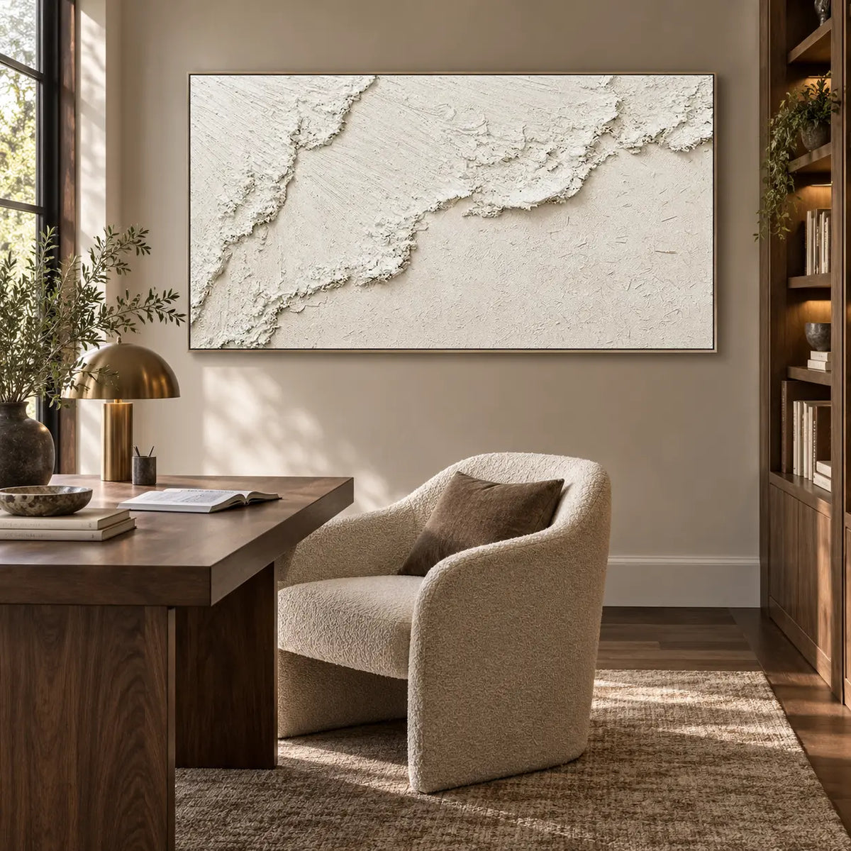 A Ridge Across Silence: beside a wood desk and cream reading chair with tall shelving