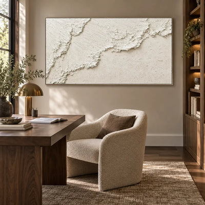 A Ridge Across Silence: beside a wood desk and cream reading chair with tall shelving