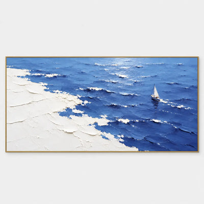 A Sail Beyond the White Margin: A small white sail sits right of center on rippled blue water