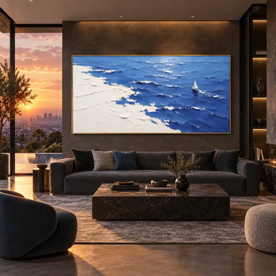 A Sail Beyond the White Margin: above a dark sofa beside sunset glazing and illuminated shelving