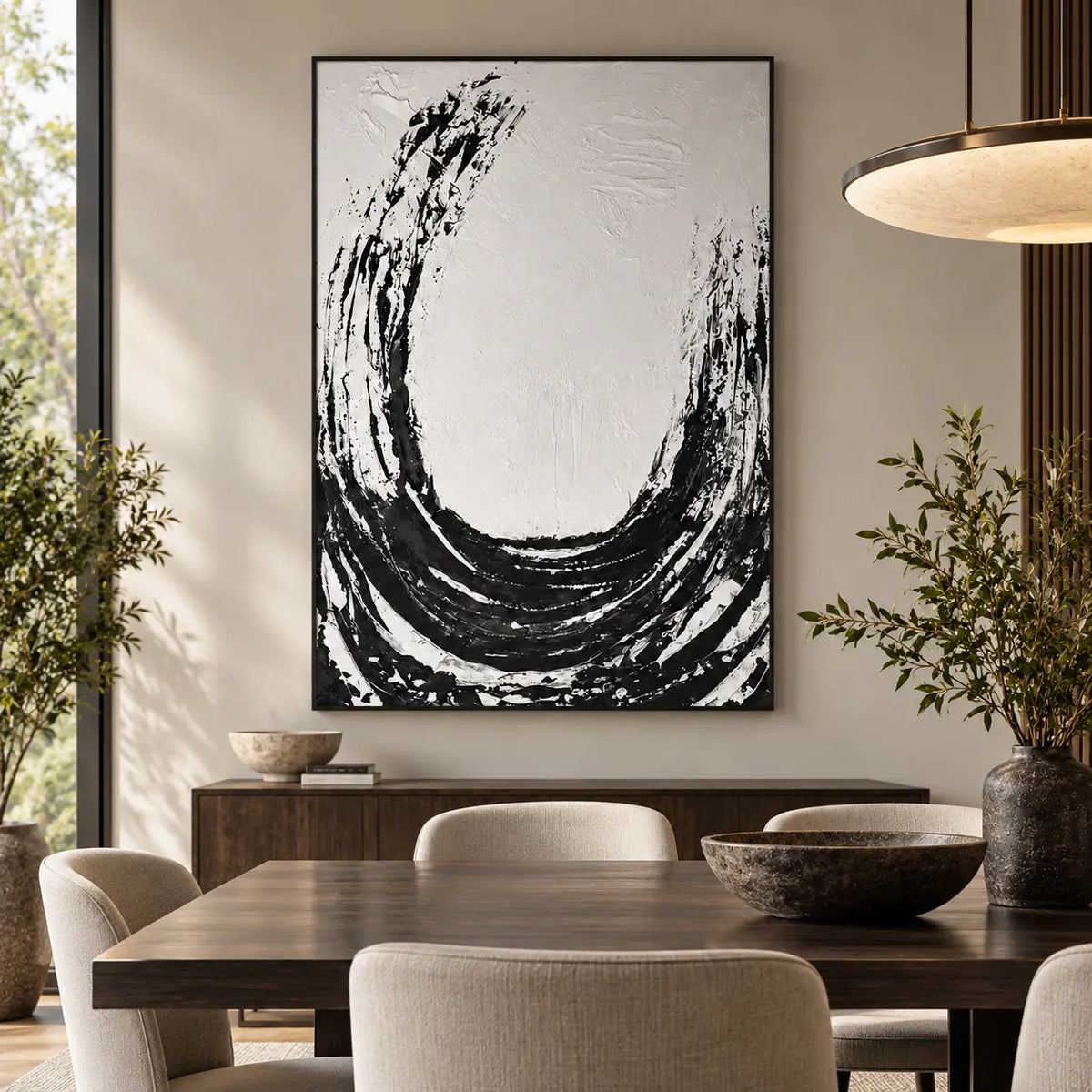 An Arc Left Open: behind a wood dining table with cream chairs beneath a wide circular pendant