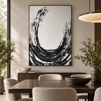 An Arc Left Open: behind a wood dining table with cream chairs beneath a wide circular pendant