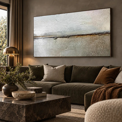 An Ochre Line in the Mist: above a dark olive sofa beside a brass lamp and marble block table