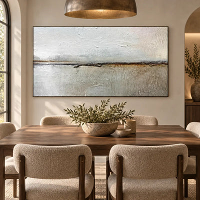 An Ochre Line in the Mist: behind a wood dining table beneath a bronze dome pendant