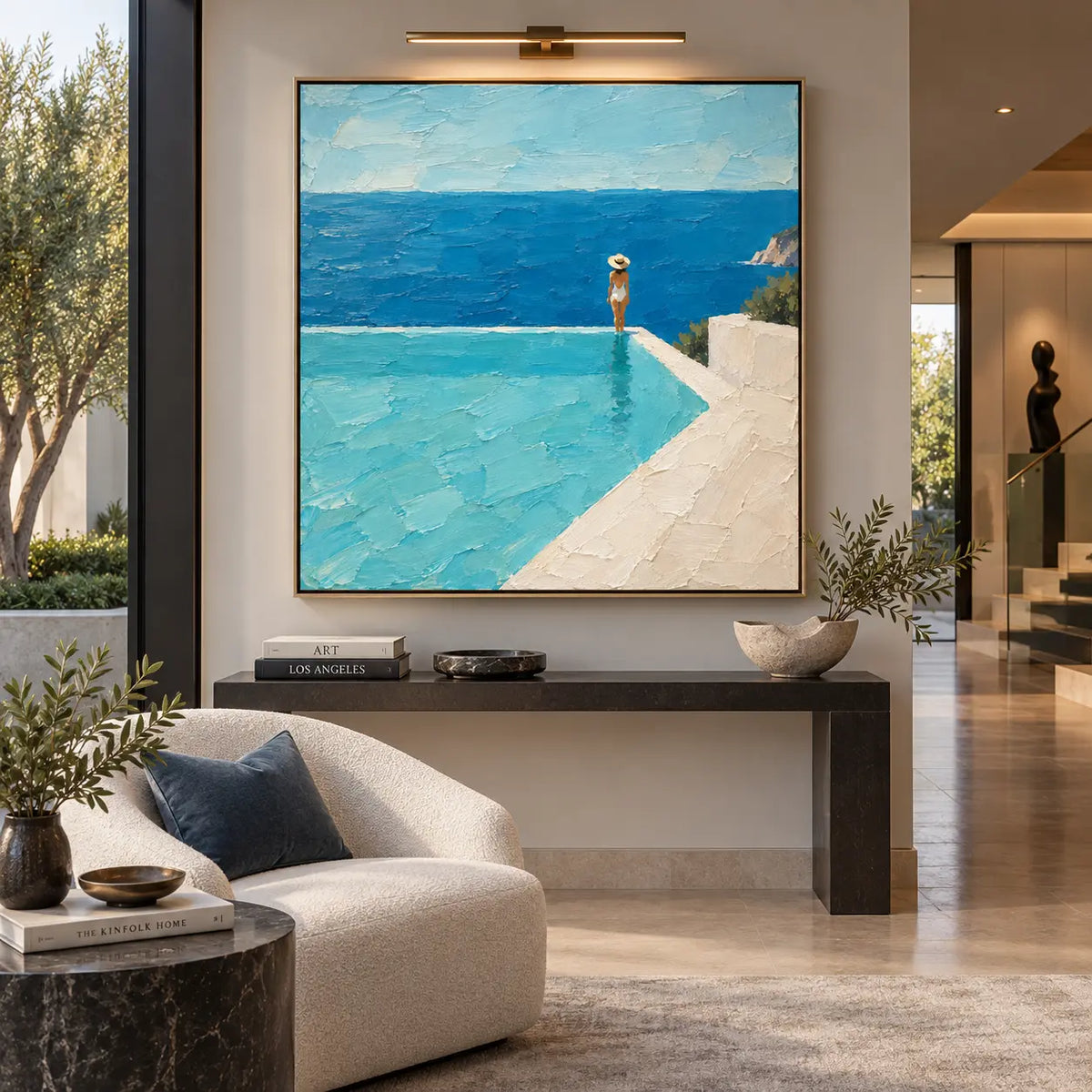 At the Infinity Corner: above a narrow dark console beside a white sofa and tall window