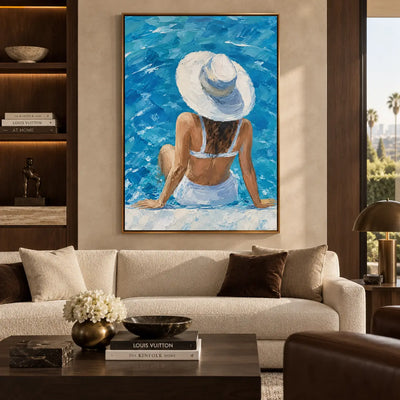 Beneath a Sunhat Brim: above a cream sofa with brown cushions and a wooden coffee table