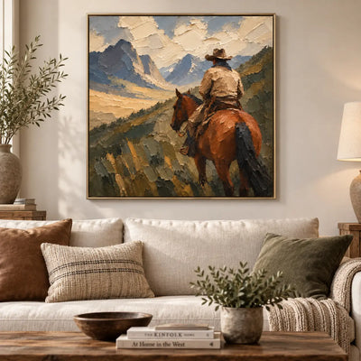 Beyond the Saddle: above a cream sofa with rust and olive cushions