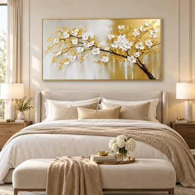 Blossoms on a Golden Bough: above a cream bed with gold-accented lamps and a padded bench