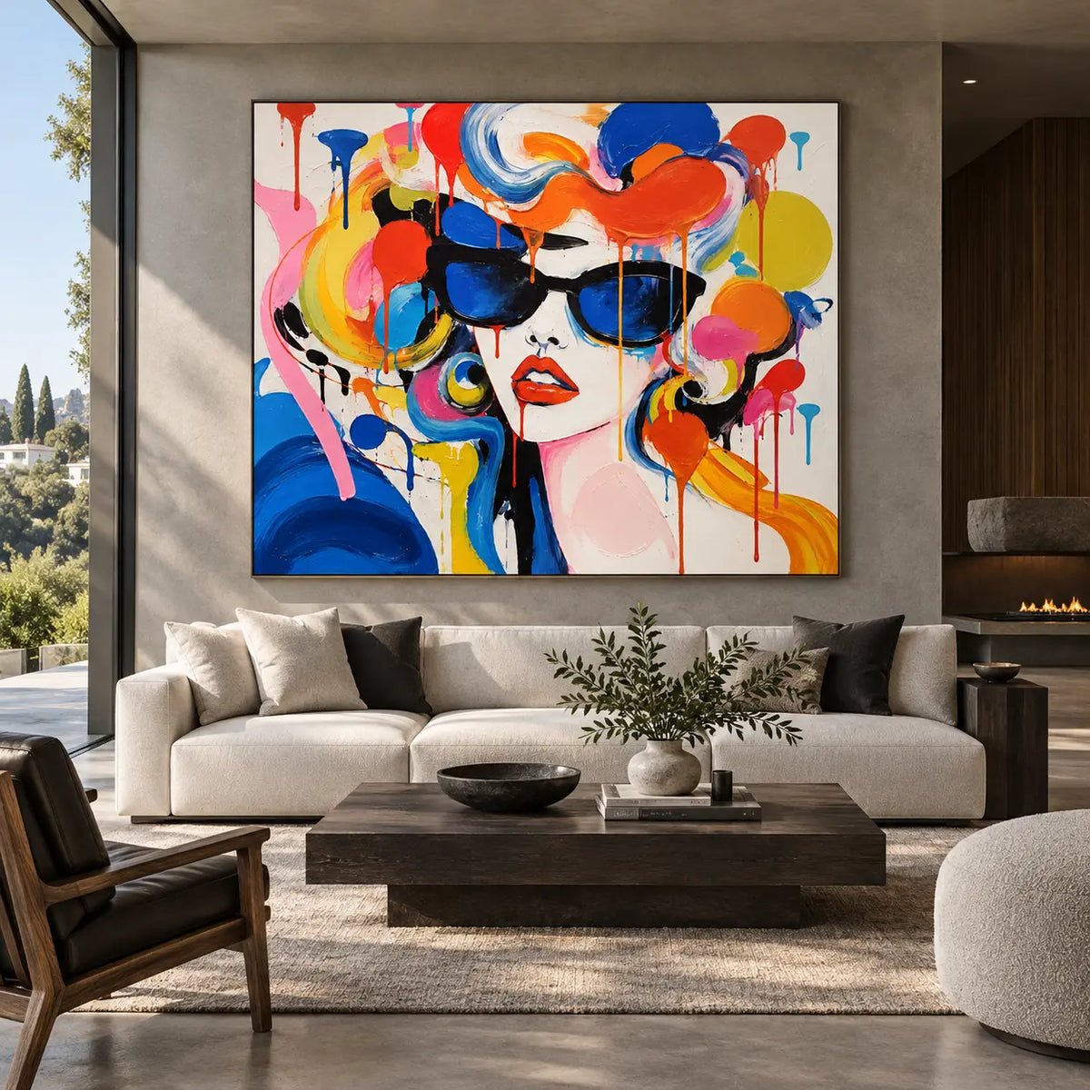 Blue Lenses and Tangerine Curls: artwork above a cream sectional with a tree view and dark wood table