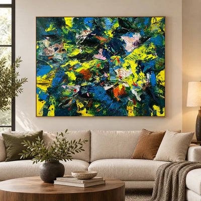 Cobalt and Citron Collision: above a cream sofa with a round wooden table and tall window