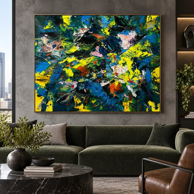 Cobalt and Citron Collision: above a dark green sofa with a black marble coffee table
