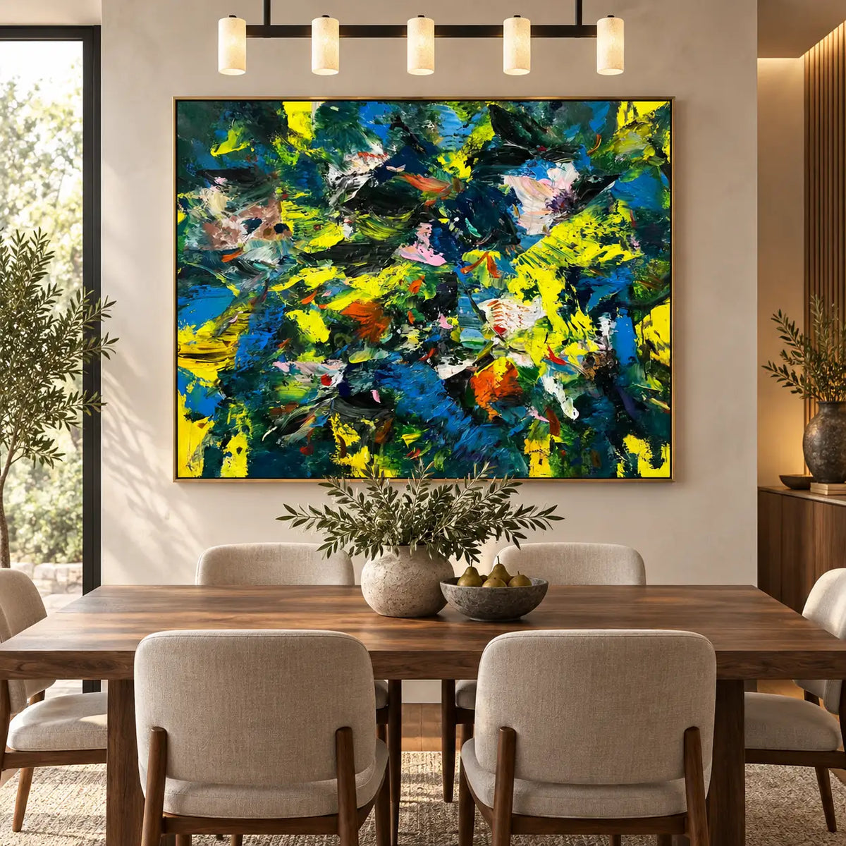 Cobalt and Citron Collision: above a wooden dining table beneath five cylinder lights