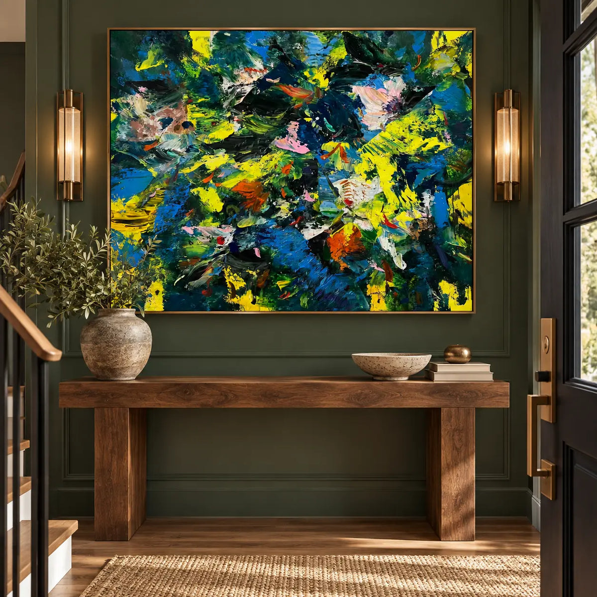Cobalt and Citron Collision: above a wooden console between brass sconces on an olive wall