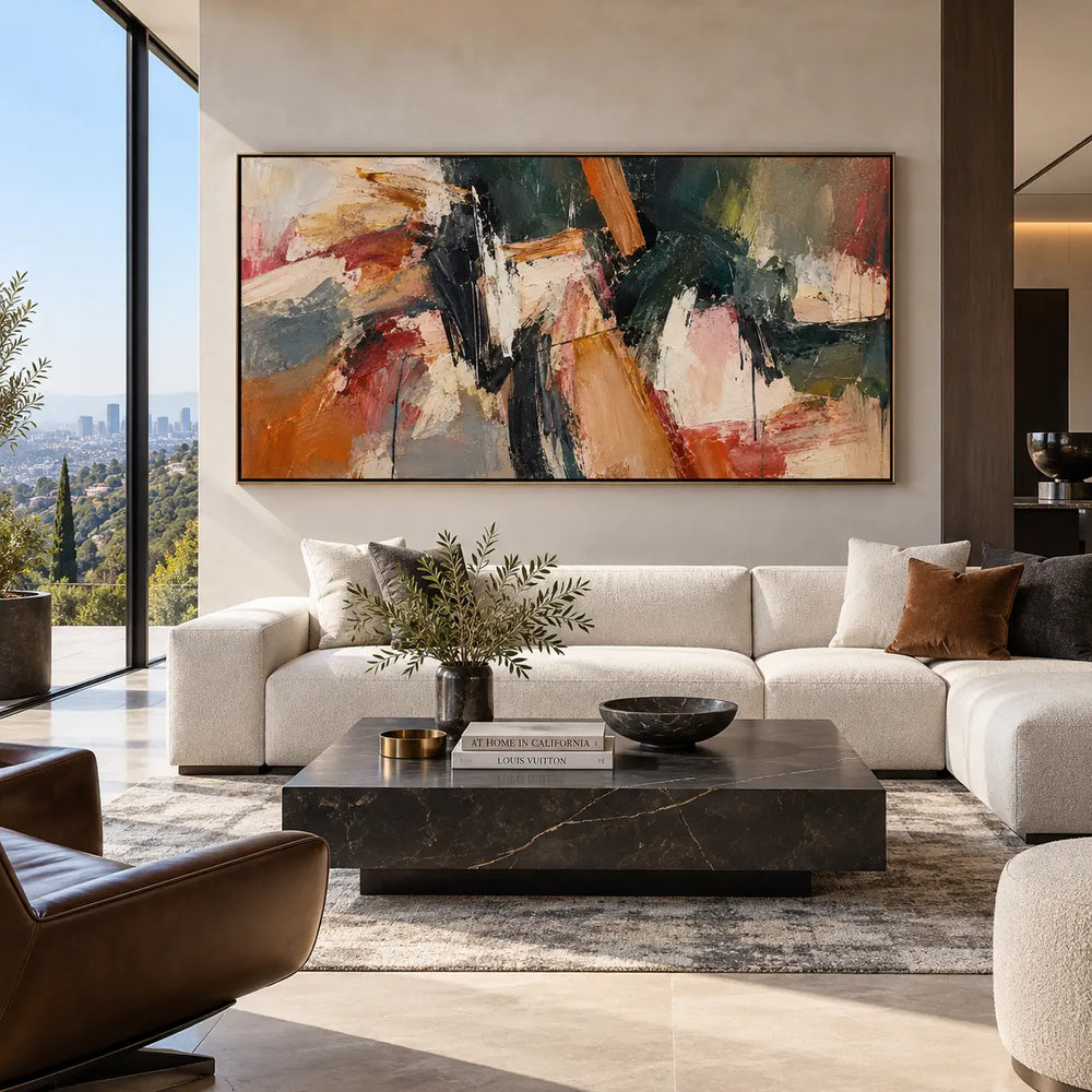Copper Angle in Deep Green: above a white sectional and marble table opposite a brown leather chair