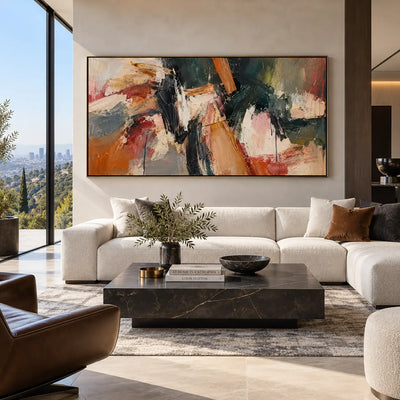 Copper Angle in Deep Green: above a white sectional and marble table opposite a brown leather chair