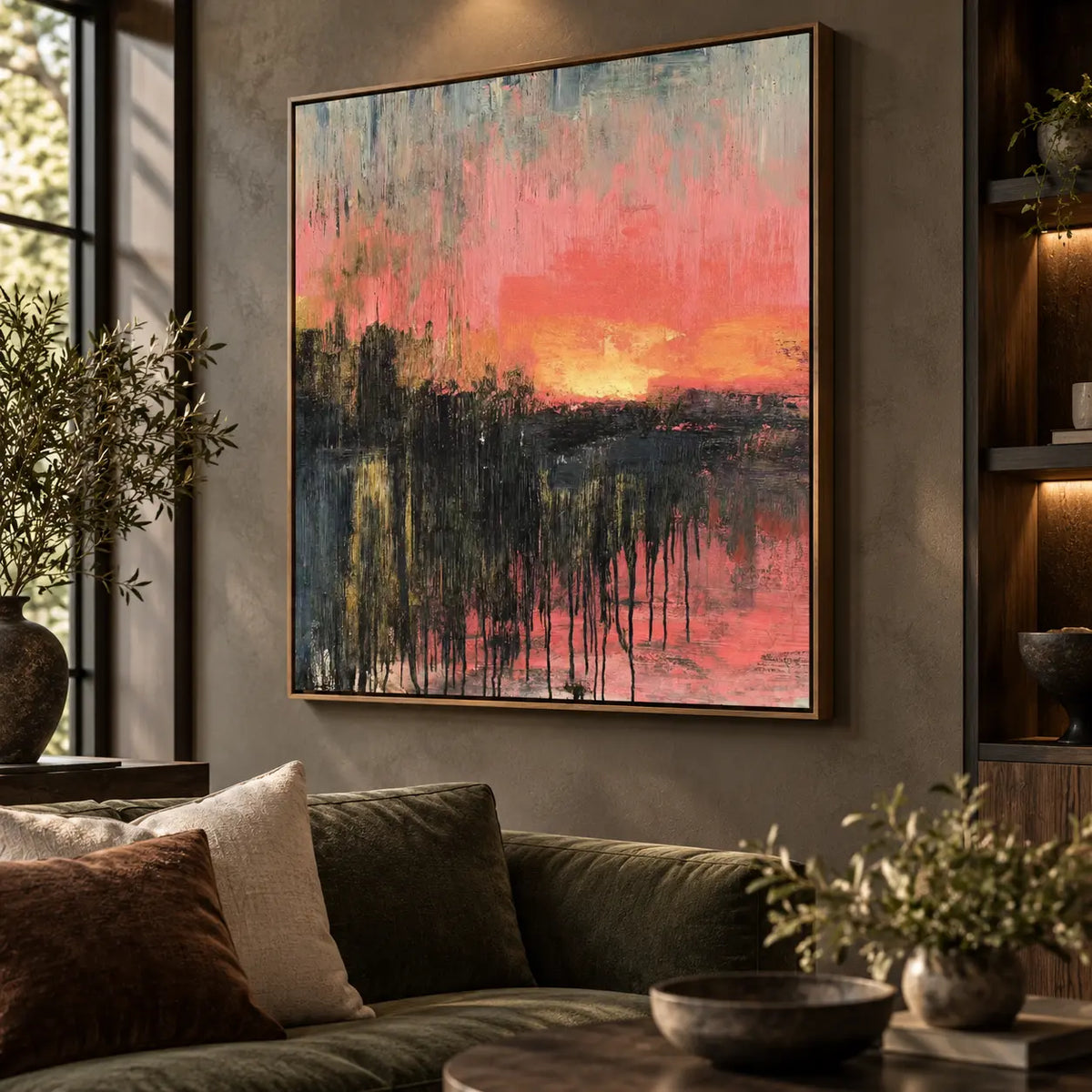 Coral Afterglow: viewed at an angle above an olive sofa beside wooden shelves